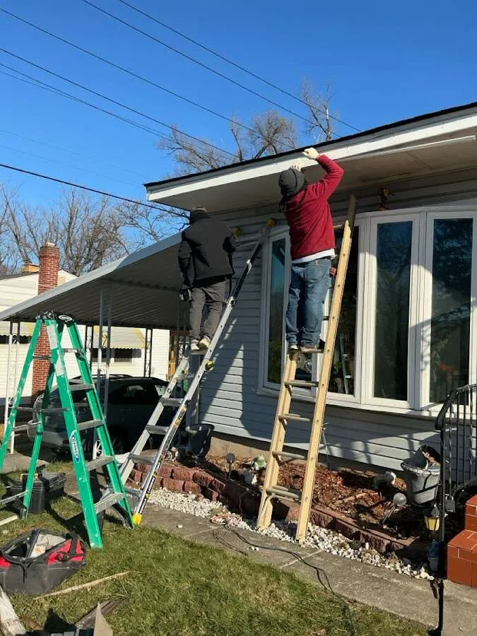 Restoration crew performing exterior repair in Royalton